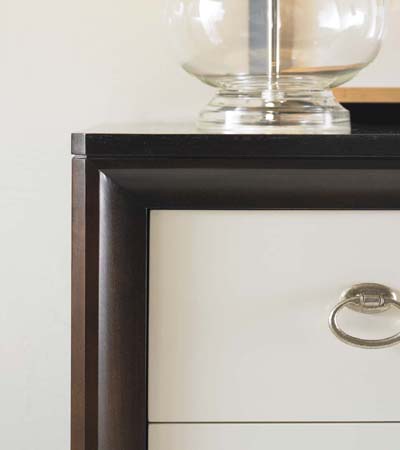 Detailed image of top left corner of dresser